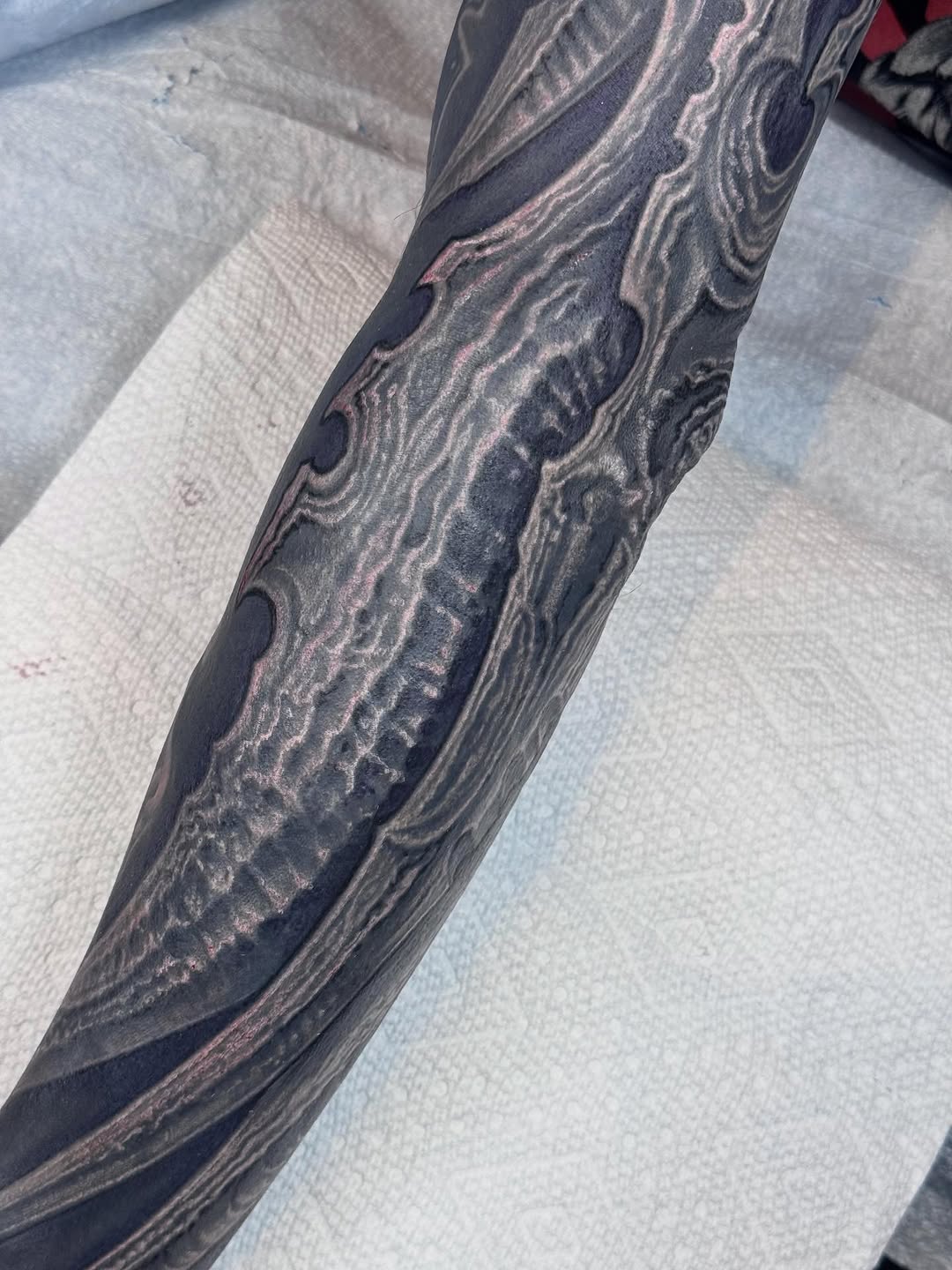 Biomechanical blackout coverup sleeve