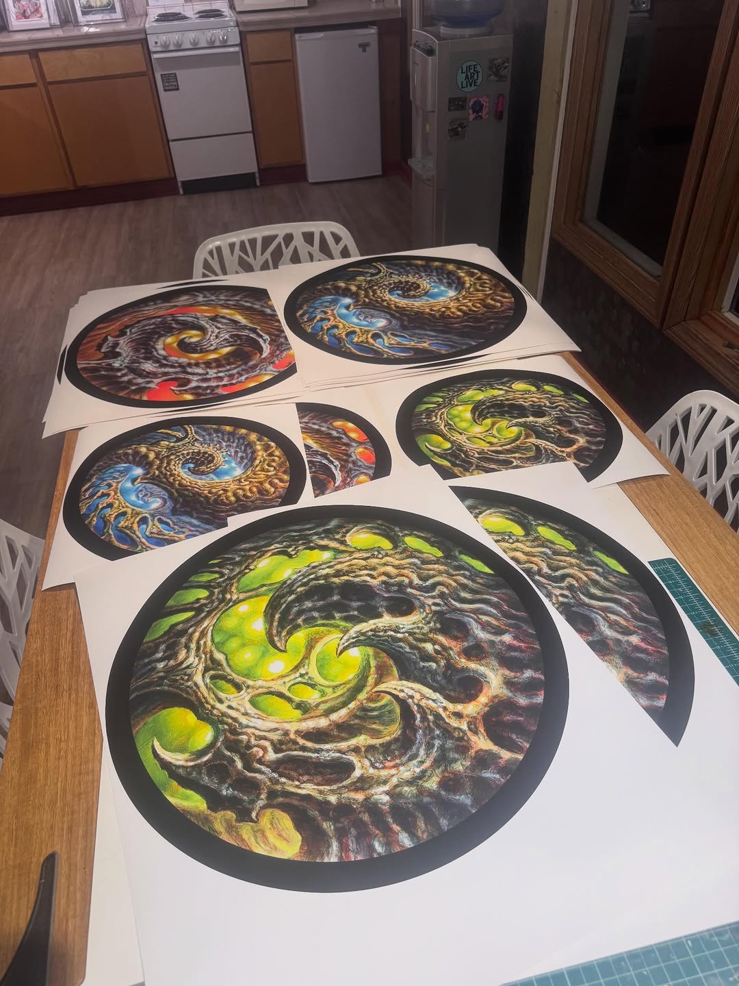 Biomechanical circular art prints by Guy Aitchison