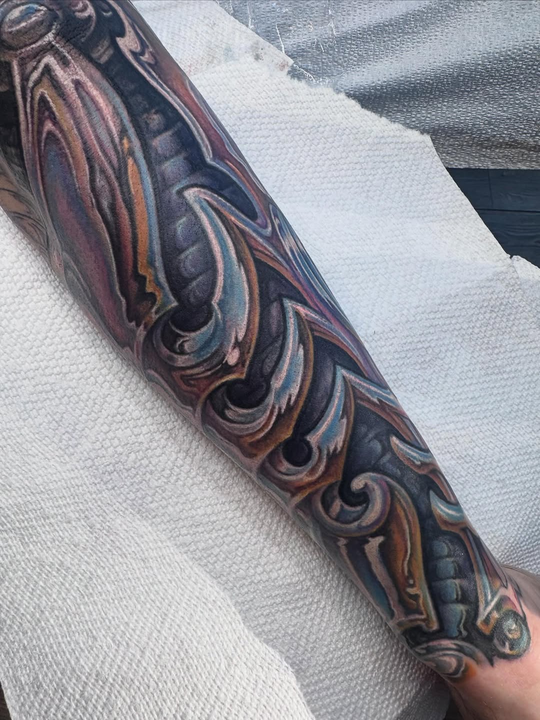 Biomechanical armor color sleeve on forearm