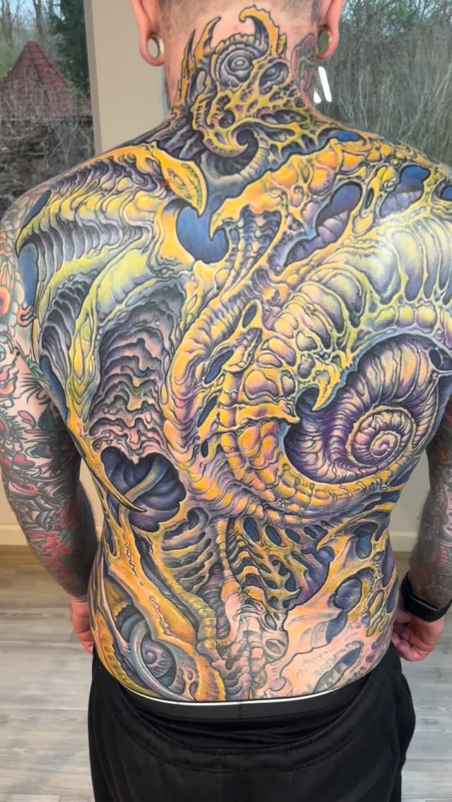Biomechanical full back coverup in color