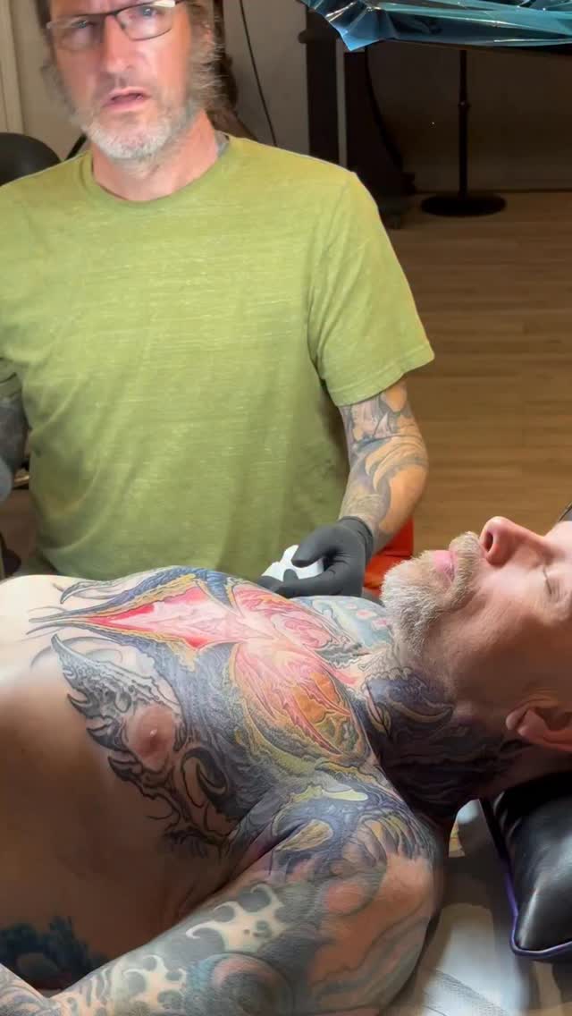 Biomechanical chest and sleeve tattoo session