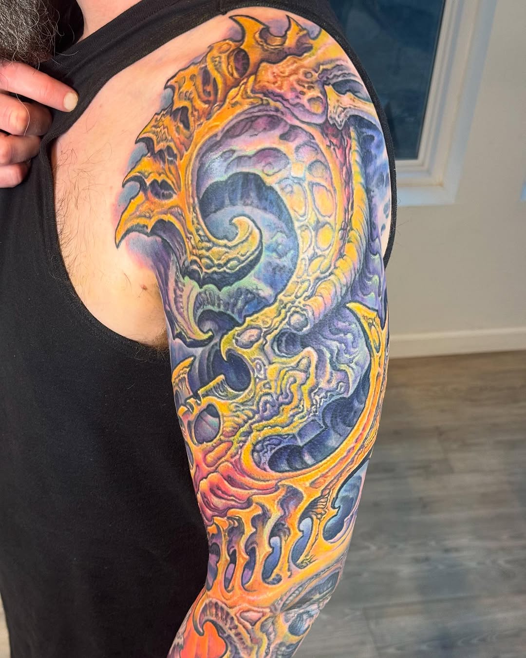 Biomechanical color coverup sleeve in orange and purple