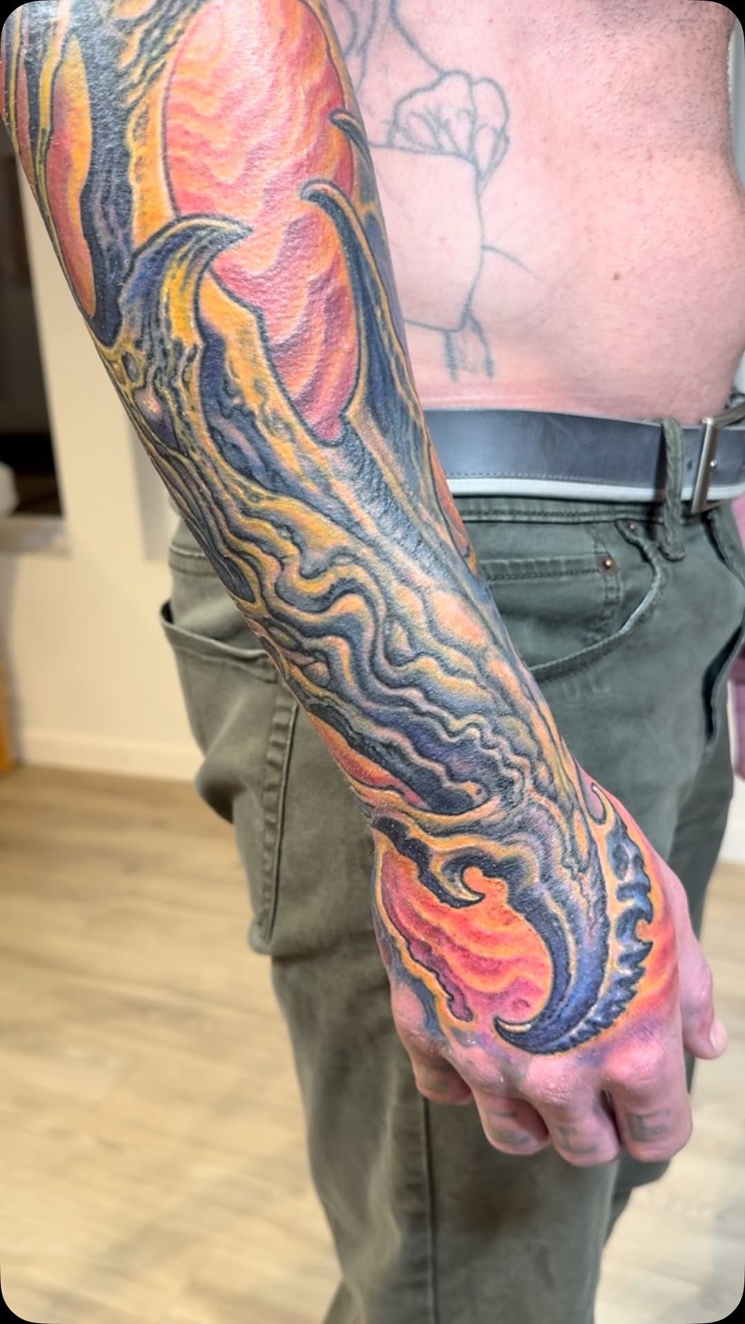 Biomechanical flame sleeve in color, forearm to hand