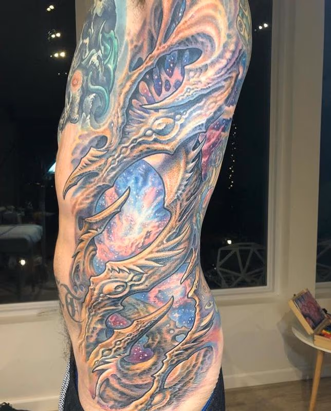 Bio Space Rib Tattoo