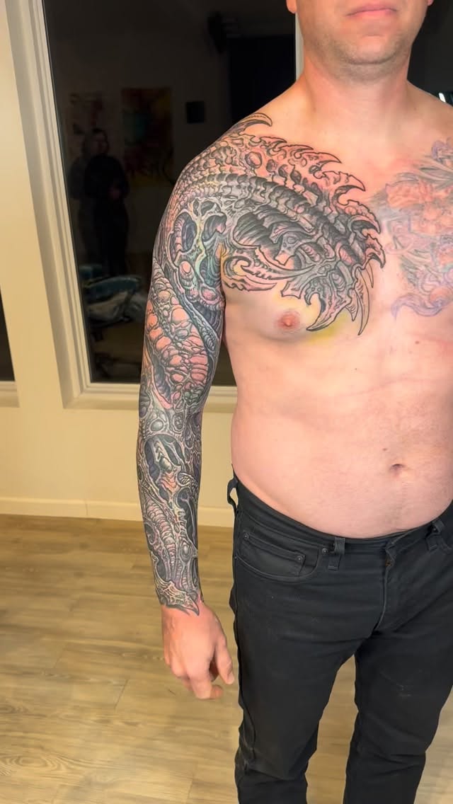 Biomechanical sleeve and chest coverup in color