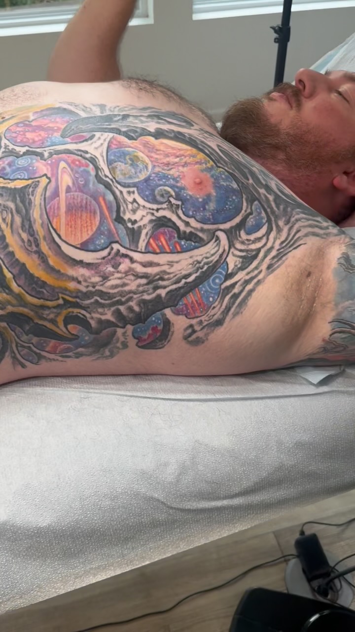Biomechanical cosmic chest panel in color