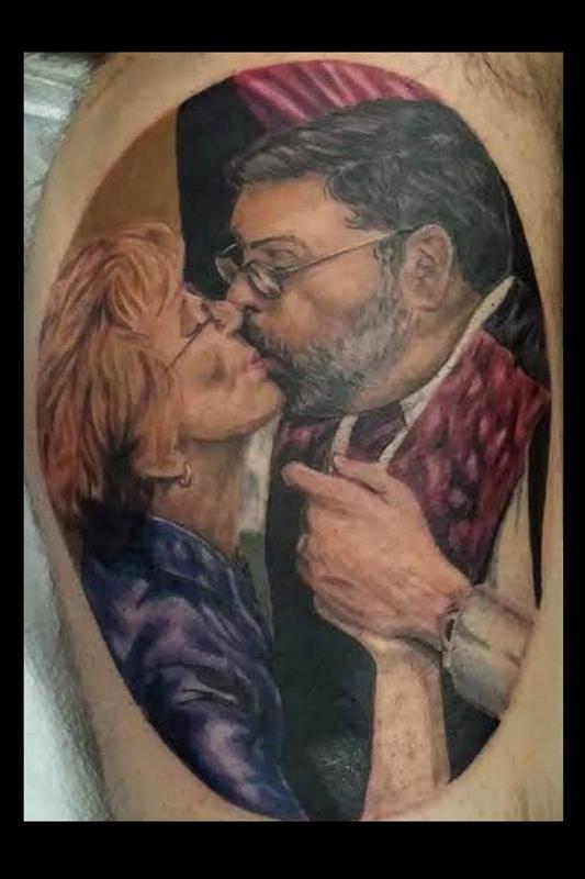 a tattoo portrait of a mom and dad