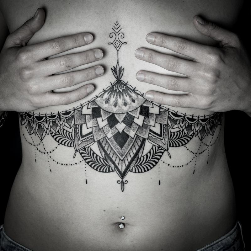 blackwork dotwork sternum mandala