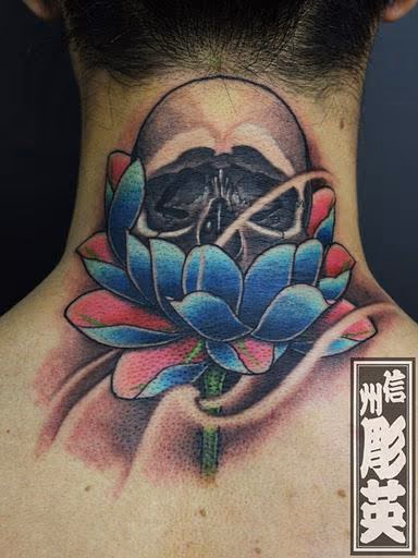 Custom Skull and Lotus Flower Tattoo