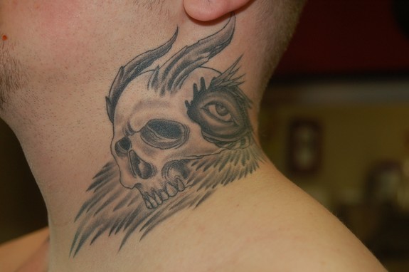 Skull on Neck Tattoo