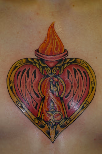 Heart with keyhole and flames