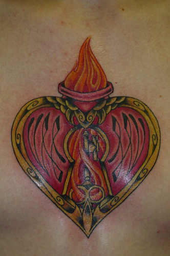 Heart with keyhole and flames