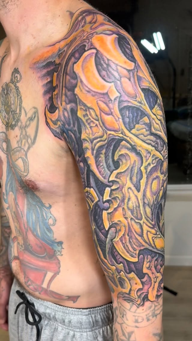 Biomechanical sleeve cover-up in orange and purple