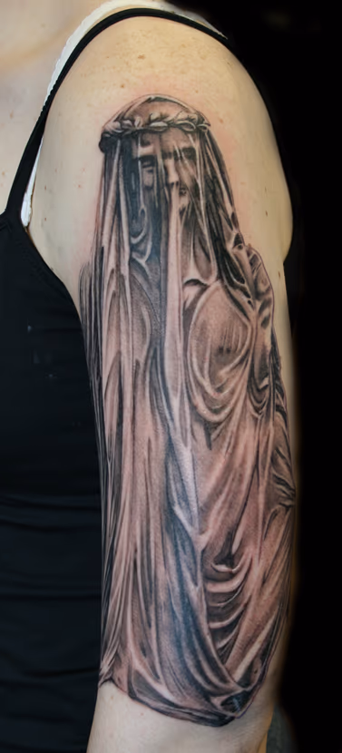 Shrouded woman