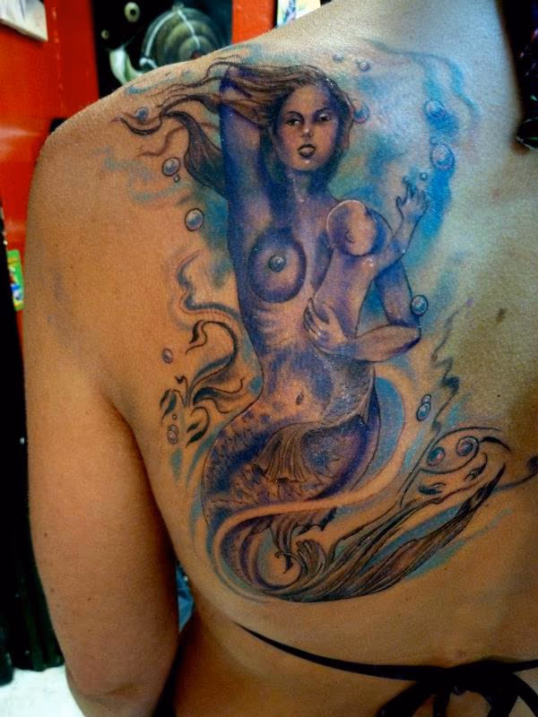 Mermaid holding baby