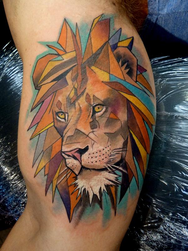 Geometric lion tattoo