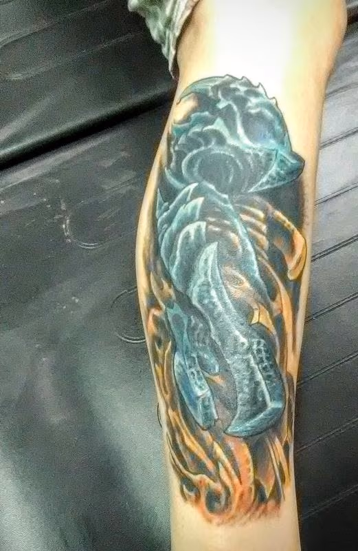 Bio mech cover up color tattoo