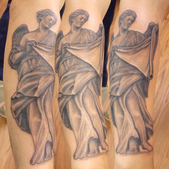 Black and grey angel tattoo