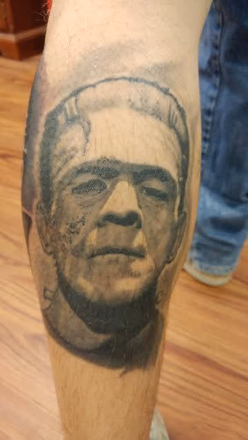 Frankenstein's Monster Black and Grey Portrait Tattoo