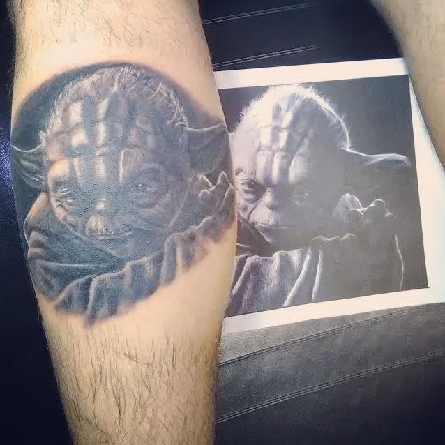Yoda black and grey portrait tattoo