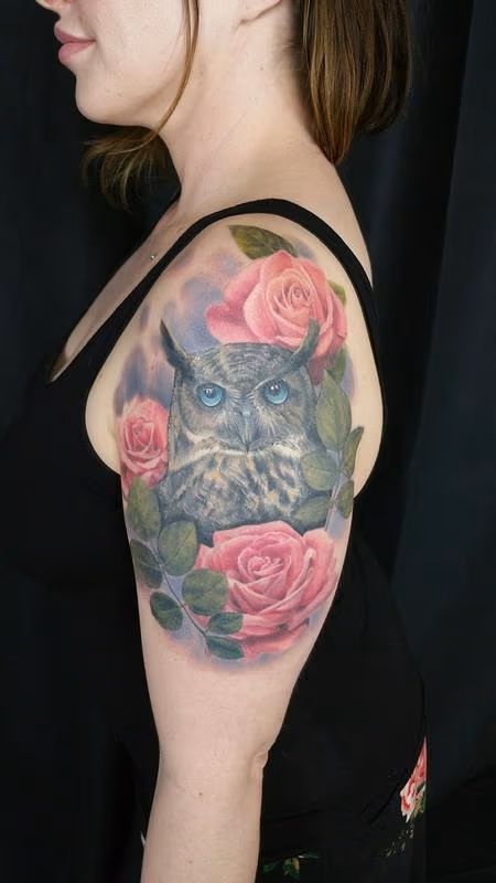 Great horned owl and roses tattoo