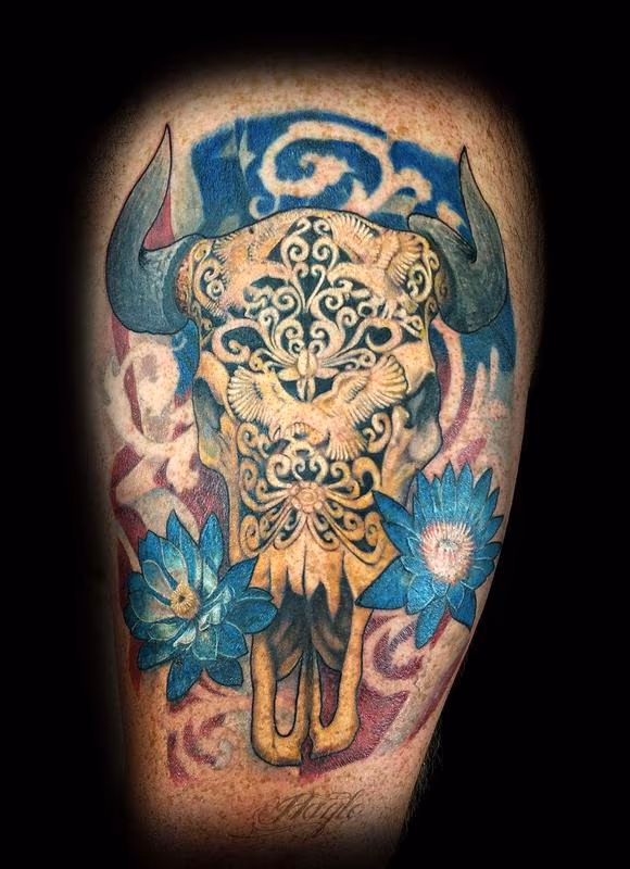 Bison skull with American flag tattoo