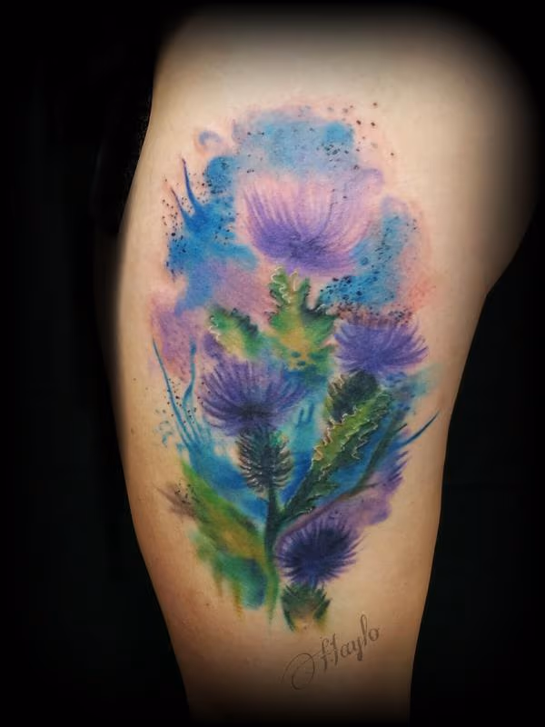 Watercolor style thistle thigh piece