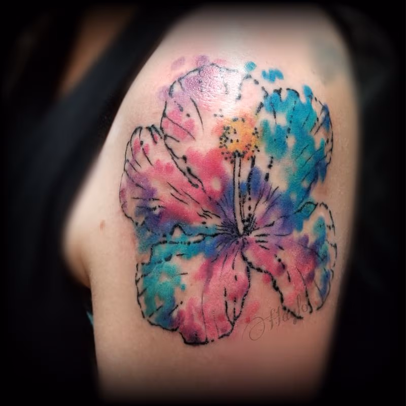 Watercolor Hibiscus shoulder tattoo by Haylo