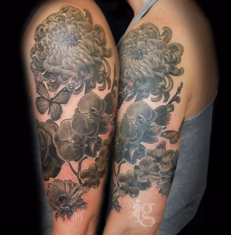 Floral black and gray half sleeve tattoo by Haylo