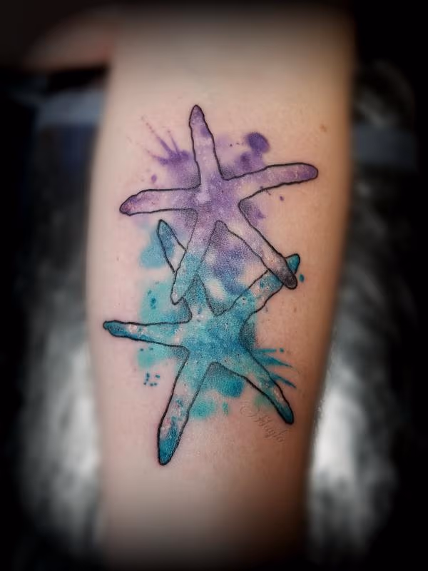 Starfish watercolor style tattoo by Haylo