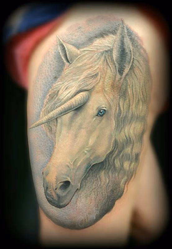 Unicorn thigh tattoo