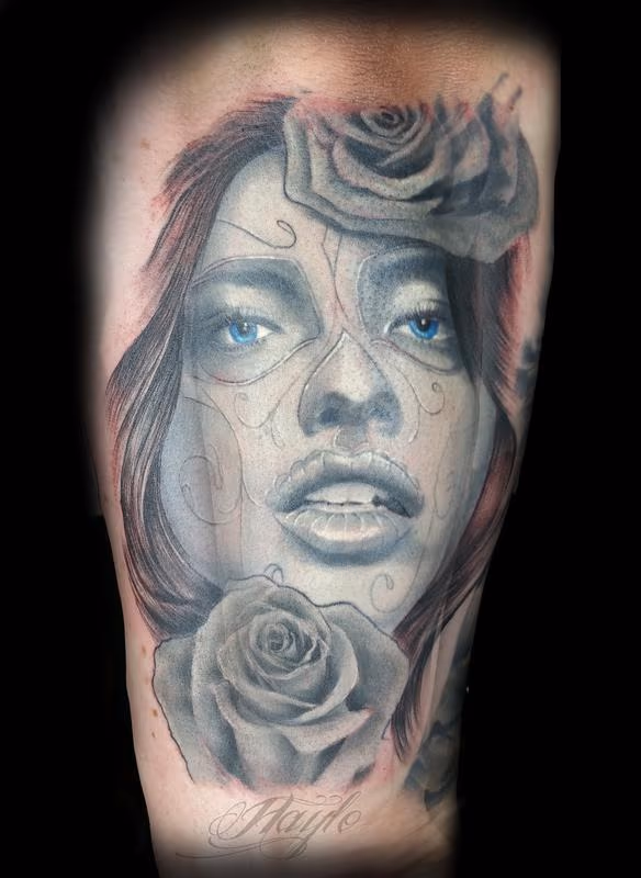 Black and gray Day of the Dead girl with roses