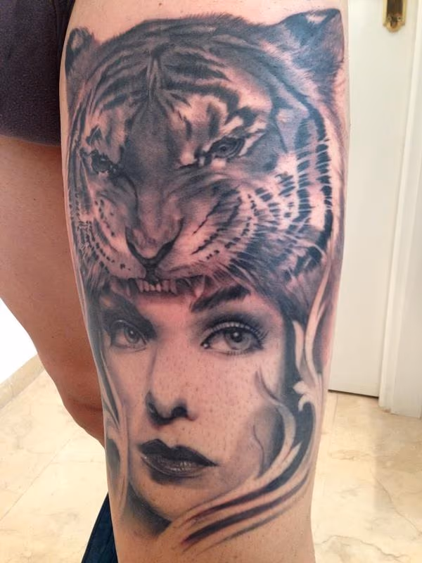 Tiger and Girl realistic black and grey leg tattoo