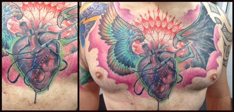 Custom heart and wings new school color chest tattoo