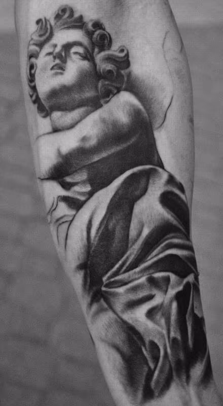 Black and Gray Statue