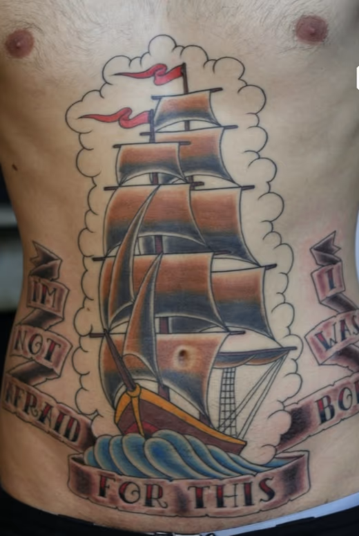 Ship tattoo with script