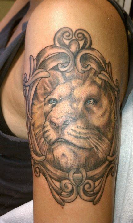 Black and Grey Lion Tattoo