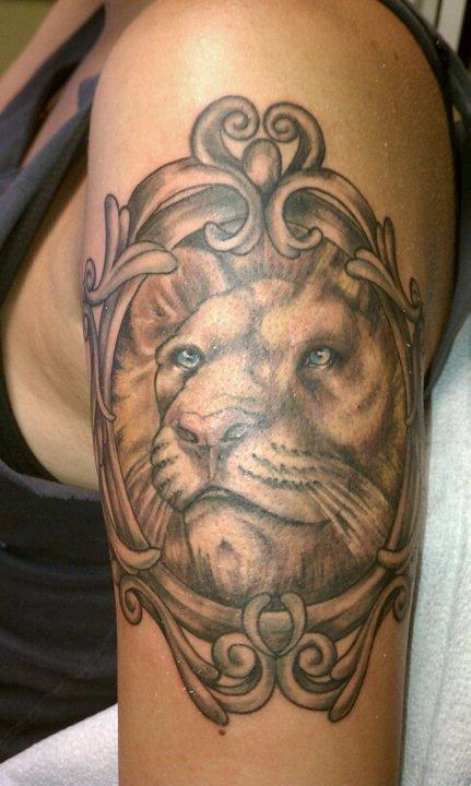 Black and Grey Lion Tattoo