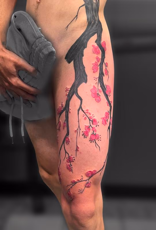 Cherry blossom branch tattoo