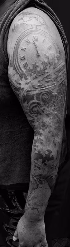 Bird and leaves tattoo