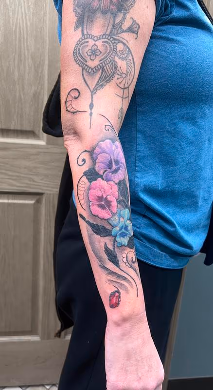 Flowers, gems, and ornamentals tattoo