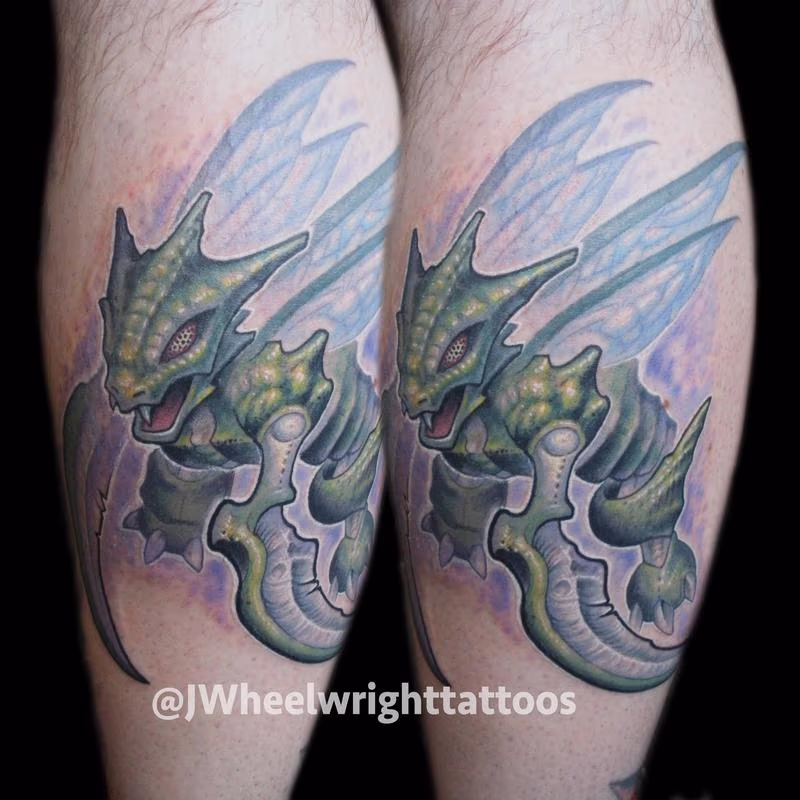 Scyther tattoo on calf