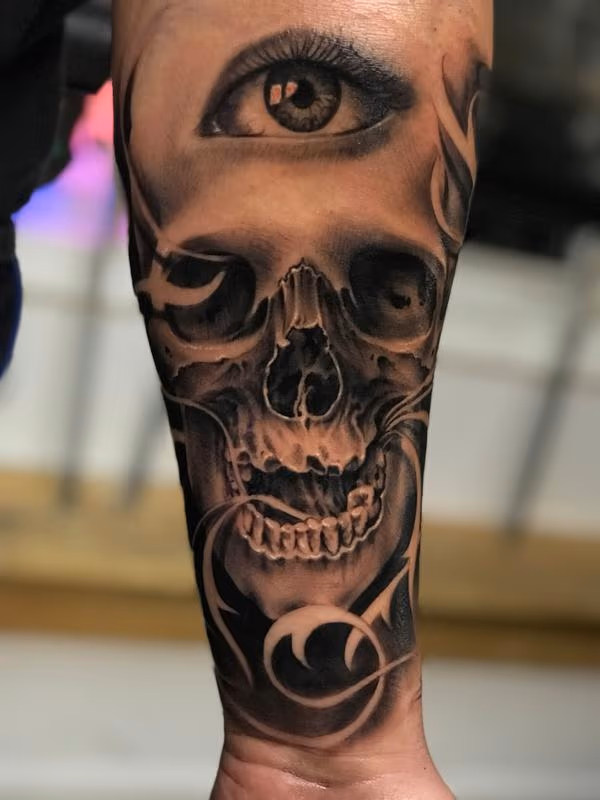 Skull and eyeball tattoo