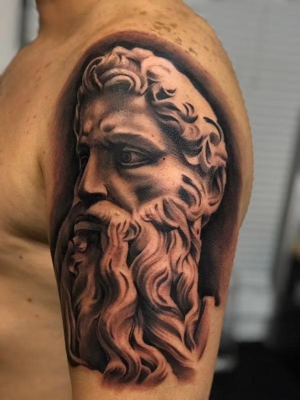 Moses statue tattoo