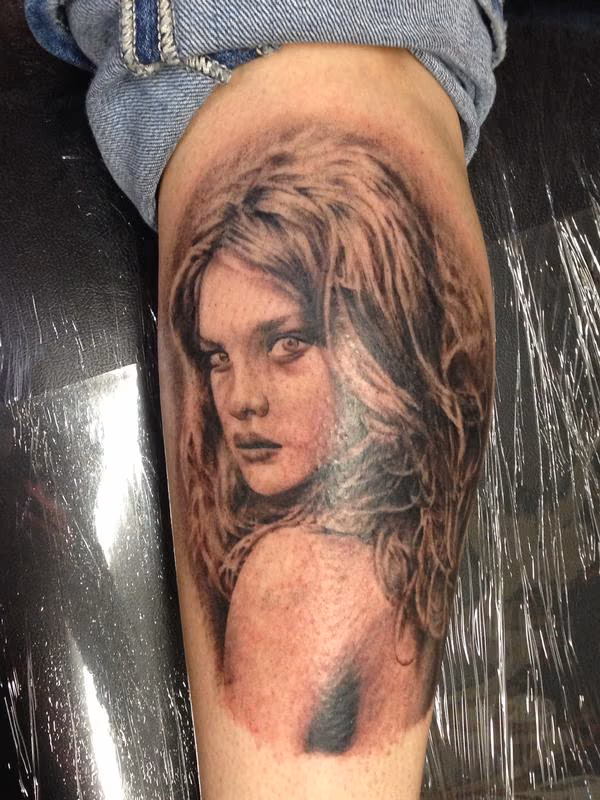 Black and Gray Portrait Tattoo