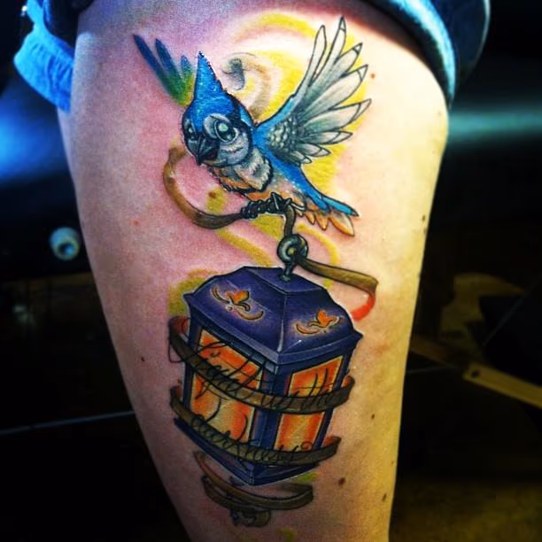 Blue jay holding a lantern 'light up the darkess"