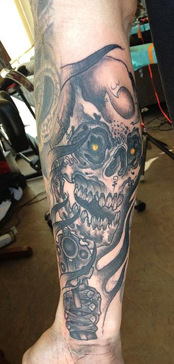 Skull and Gun Tattoo