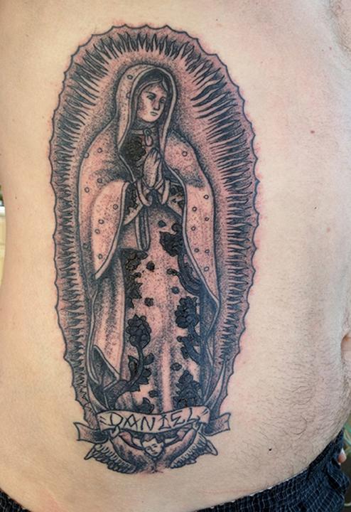 Black dot work Lady of Guadalupe Tattoo