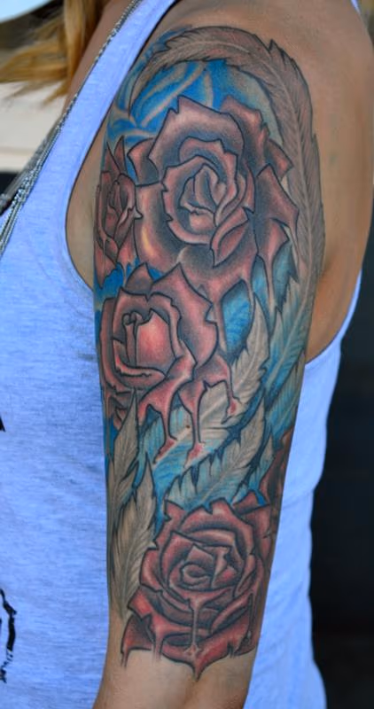 Wing and Roses Tattoo