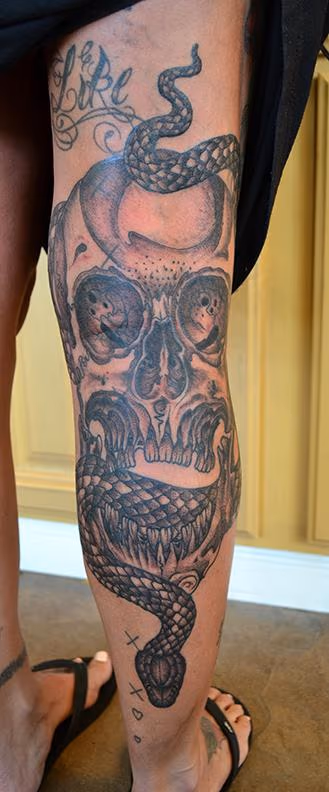 Black and Grey Skull and Snake Tattoo